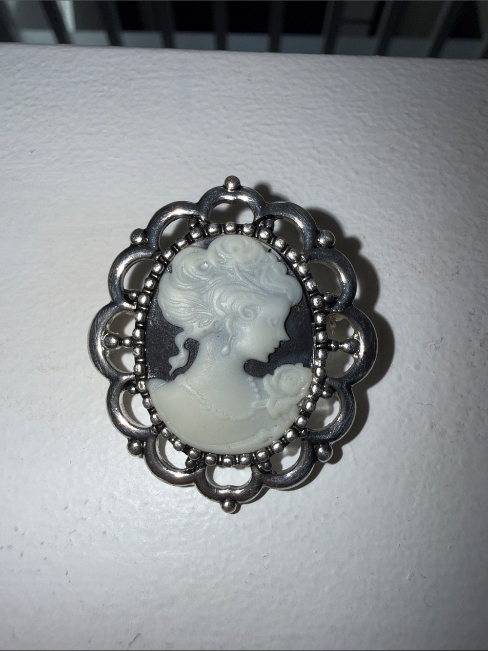 Vintage-Inspired White Cameo Brooch in Silver Tone Frame